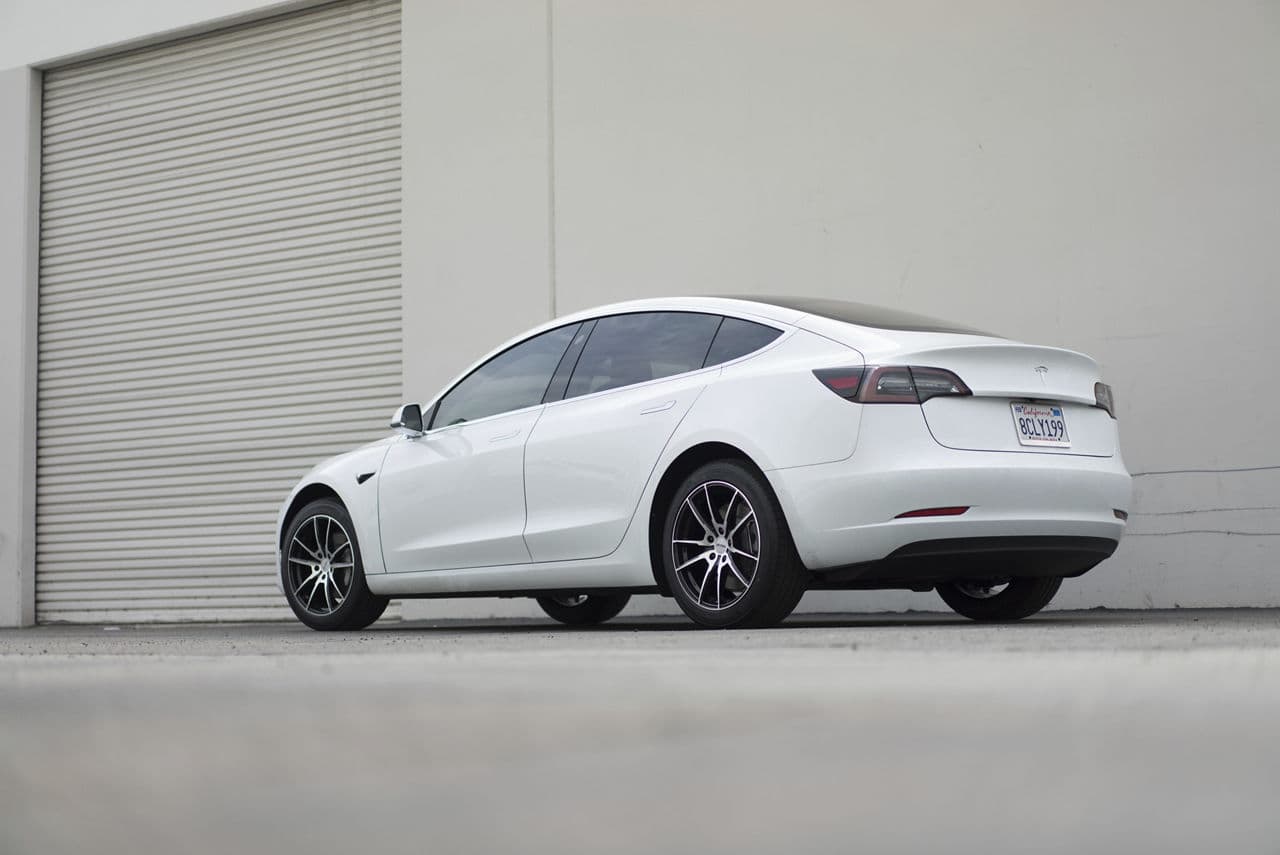 Side profile of 2018 Tesla Model 3 with wheels