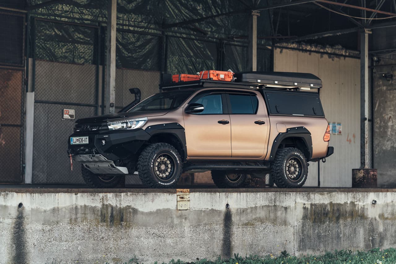 Side profile of 2018 Toyota Hilux with truck suv wheels