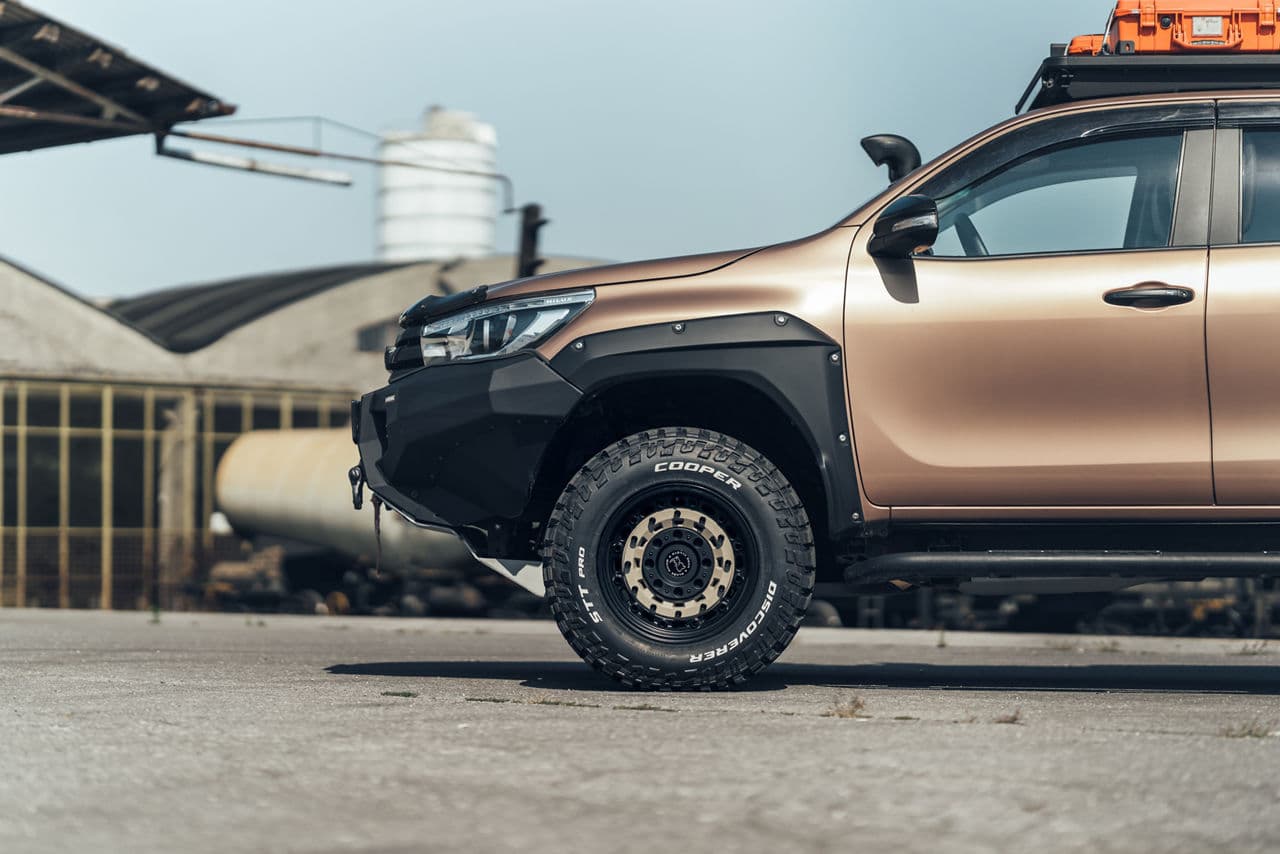 Rear view of 2018 Toyota Hilux with truck suv wheels