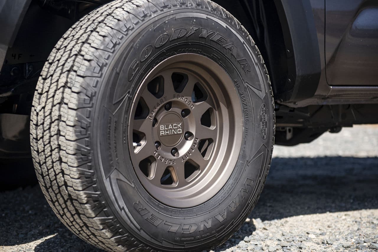 Side profile of 2018 Toyota Tacoma TRD with truck suv wheels