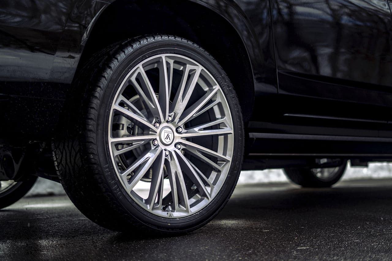 Rear view of 2019 Cadillac Escalade with wheels
