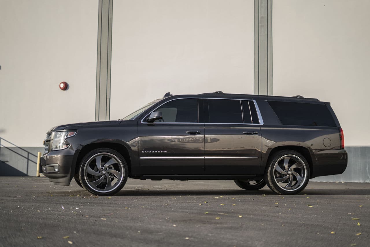 Side profile of 2019 Chevrolet Suburban with wheels