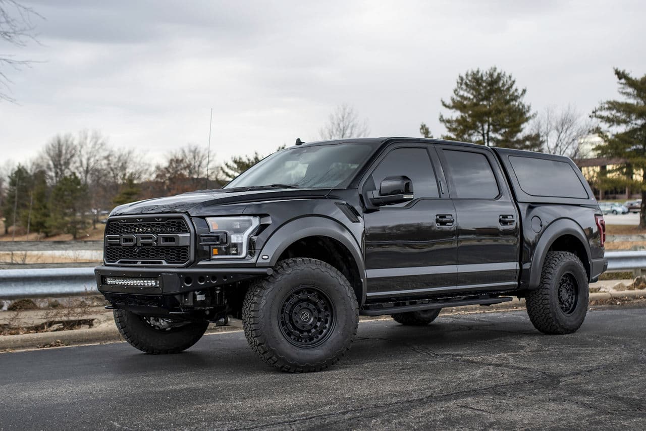 Front view of 2019 Ford F150 Raptor with truck suv wheels