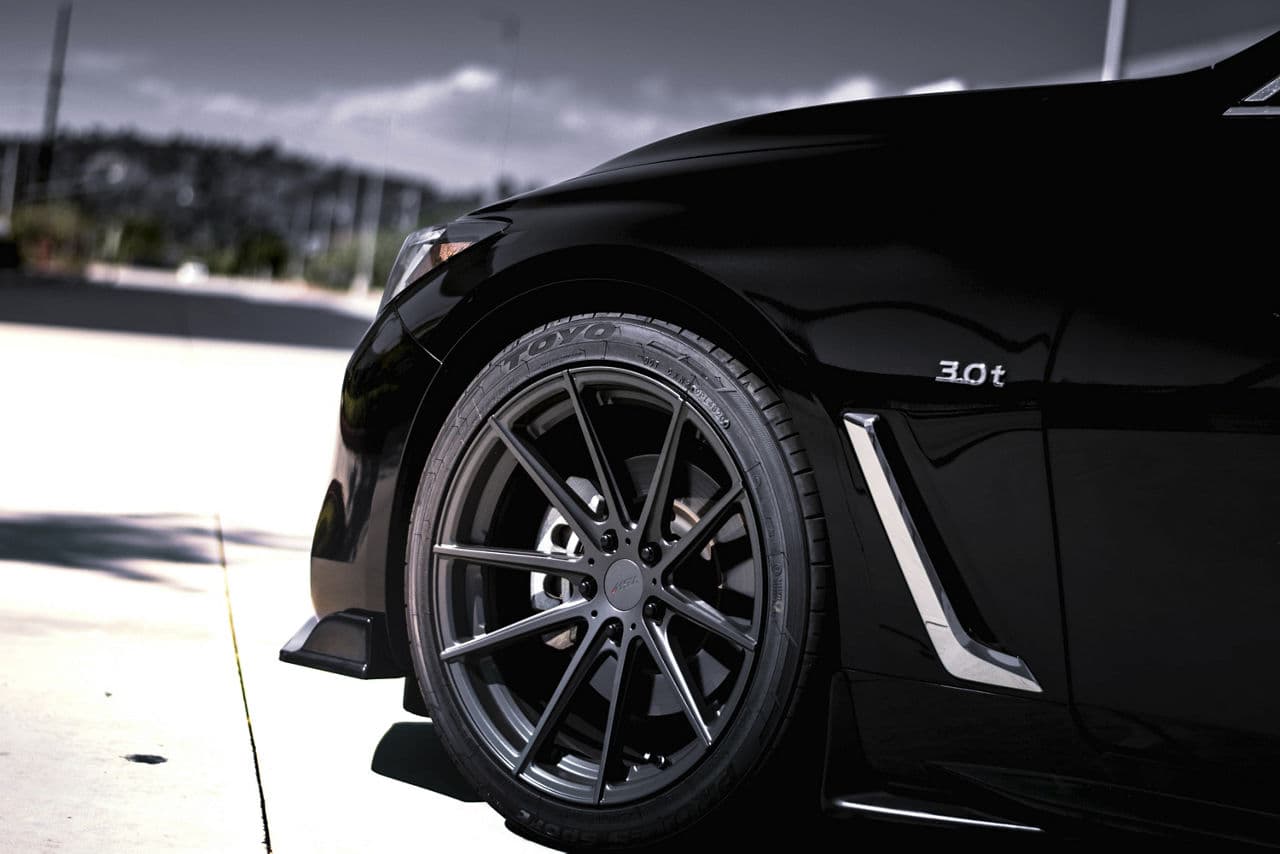 Rear view of 2019 Infiniti Q60 with wheels