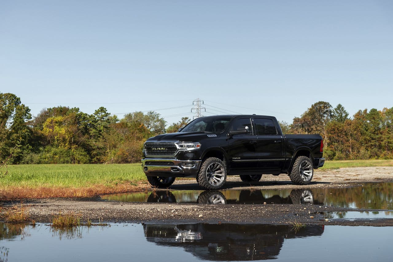 Side profile of 2019 Ram 1500 Limited with wheels