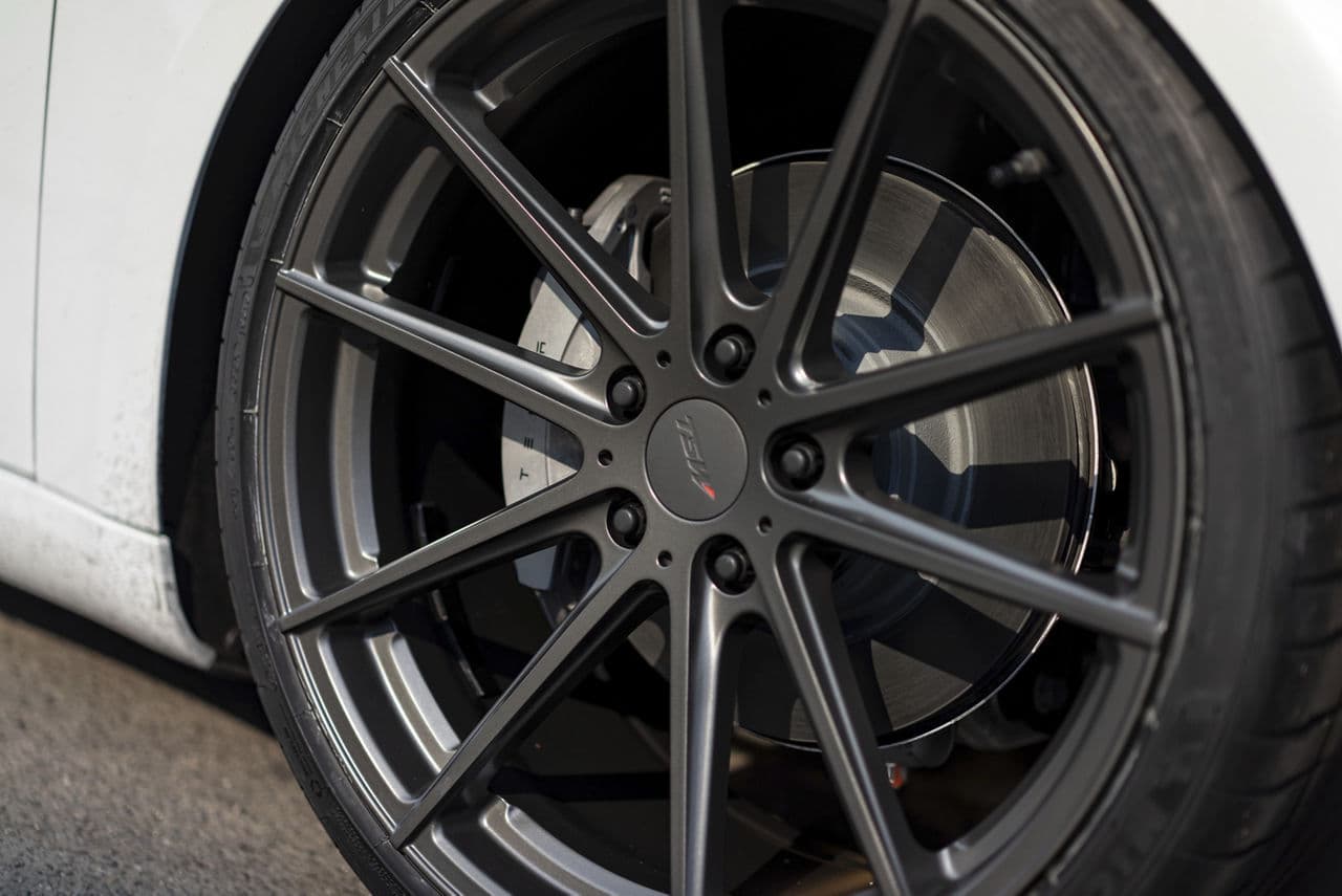 Side profile of 2019 Tesla Model 3 with wheels