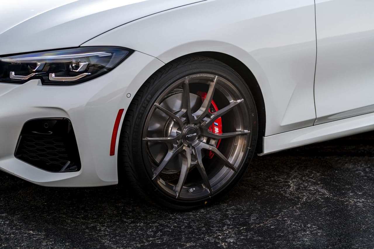 Side profile of 2020 BMW M340i with wheels