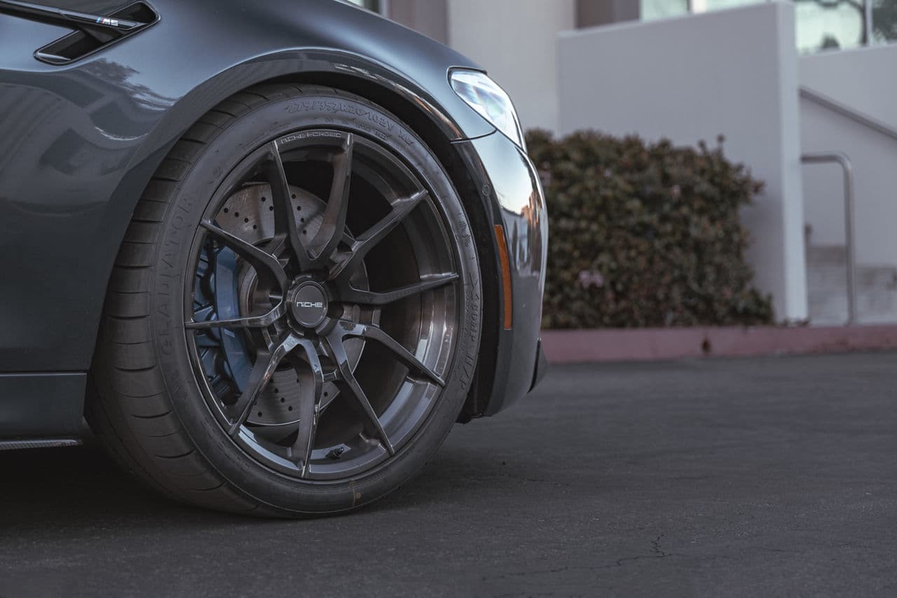 Rear view of 2020 BMW M5 with vehicle wraps