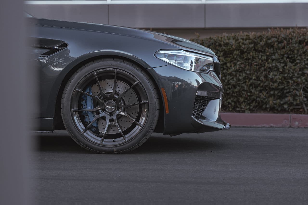 Detail view of 2020 BMW M5 with vehicle wraps