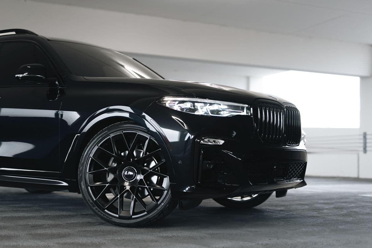 Rear view of 2020 BMW X7 with wheels