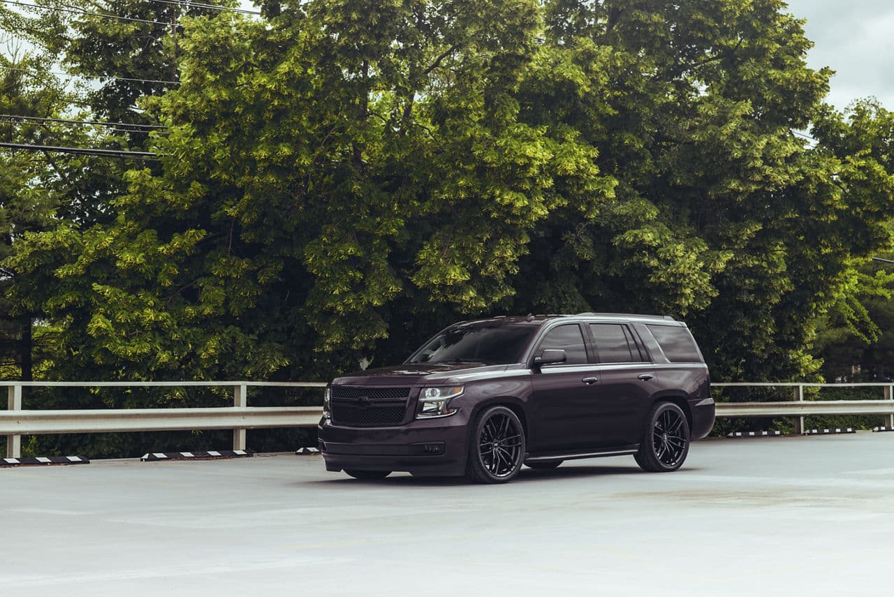 Side profile of 2020 Chevrolet Tahoe with wheels