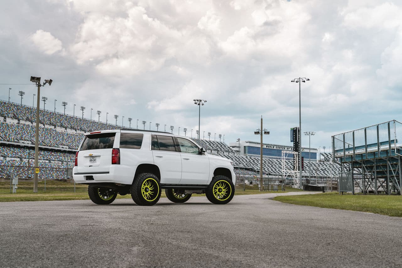 Side profile of 2020 Chevrolet Tahoe with wheels