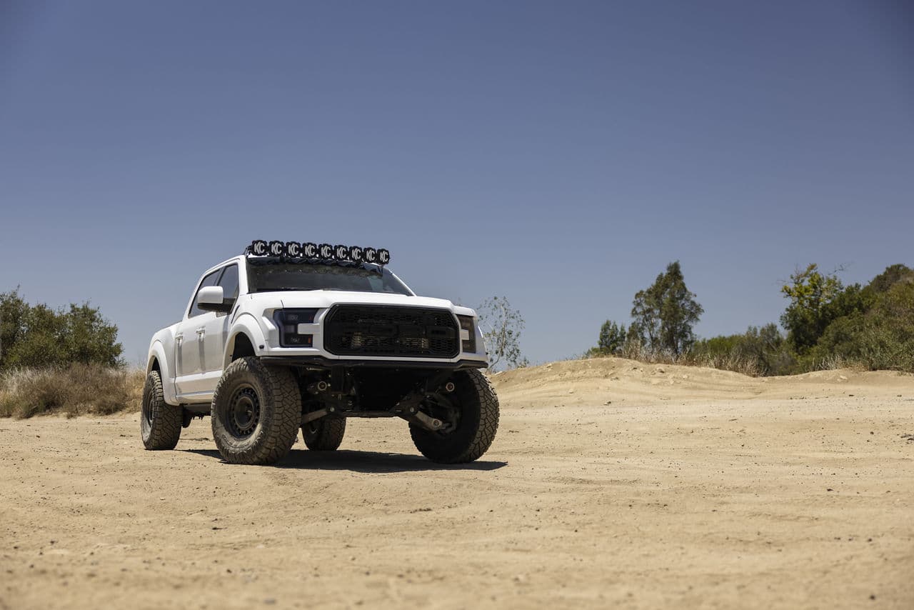 Front view of 2020 Ford F150 Raptor with truck suv wheels