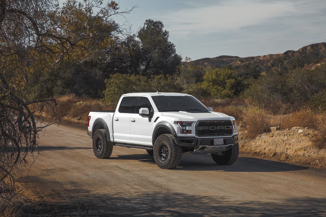 Front view of 2020 Ford F150 Raptor with truck suv wheels