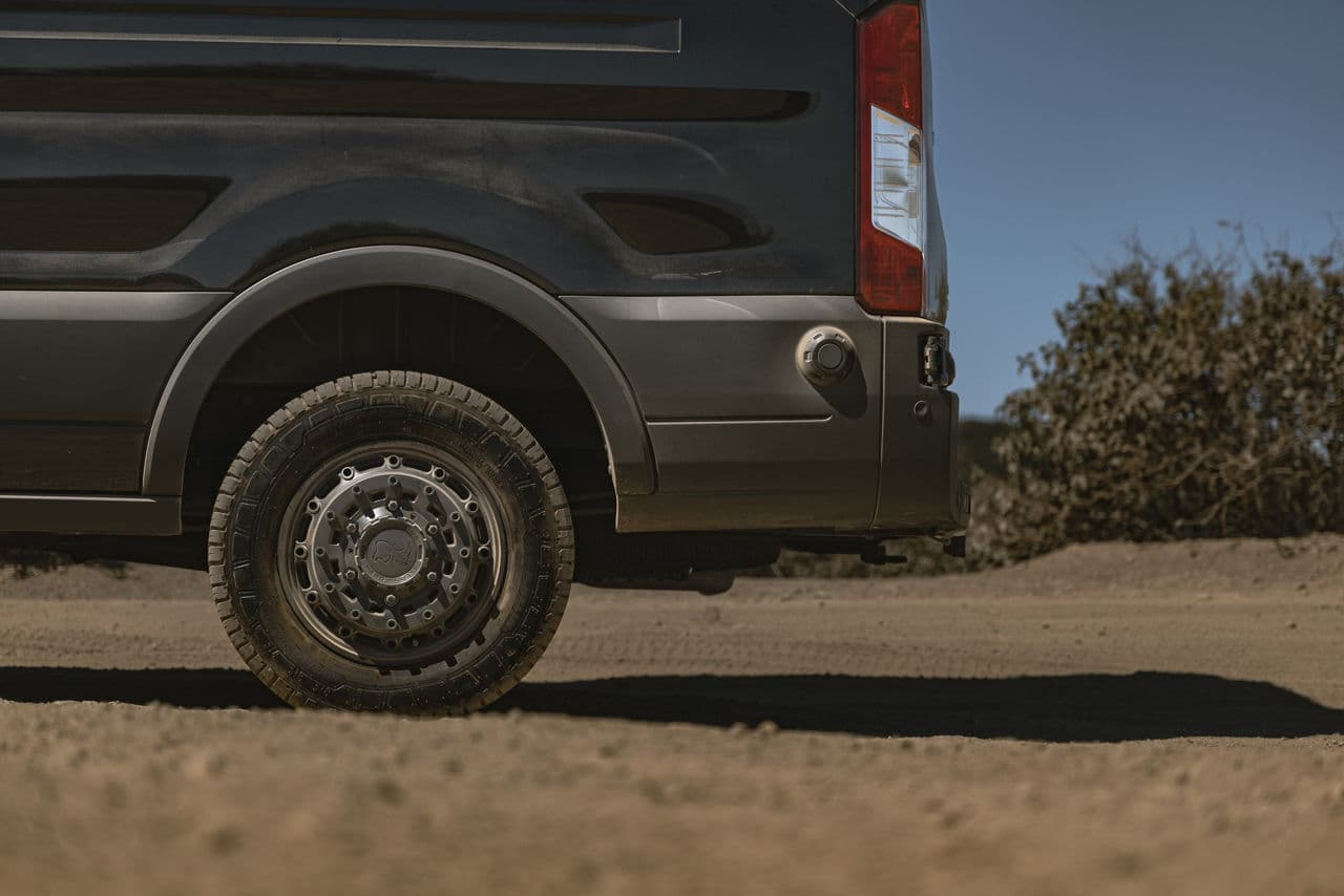 Side profile of 2020 Ford Transit with wheels