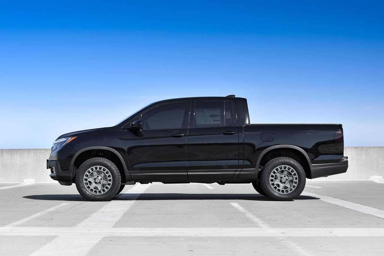 Side profile of 2020 Honda Ridgeline with vehicle wraps