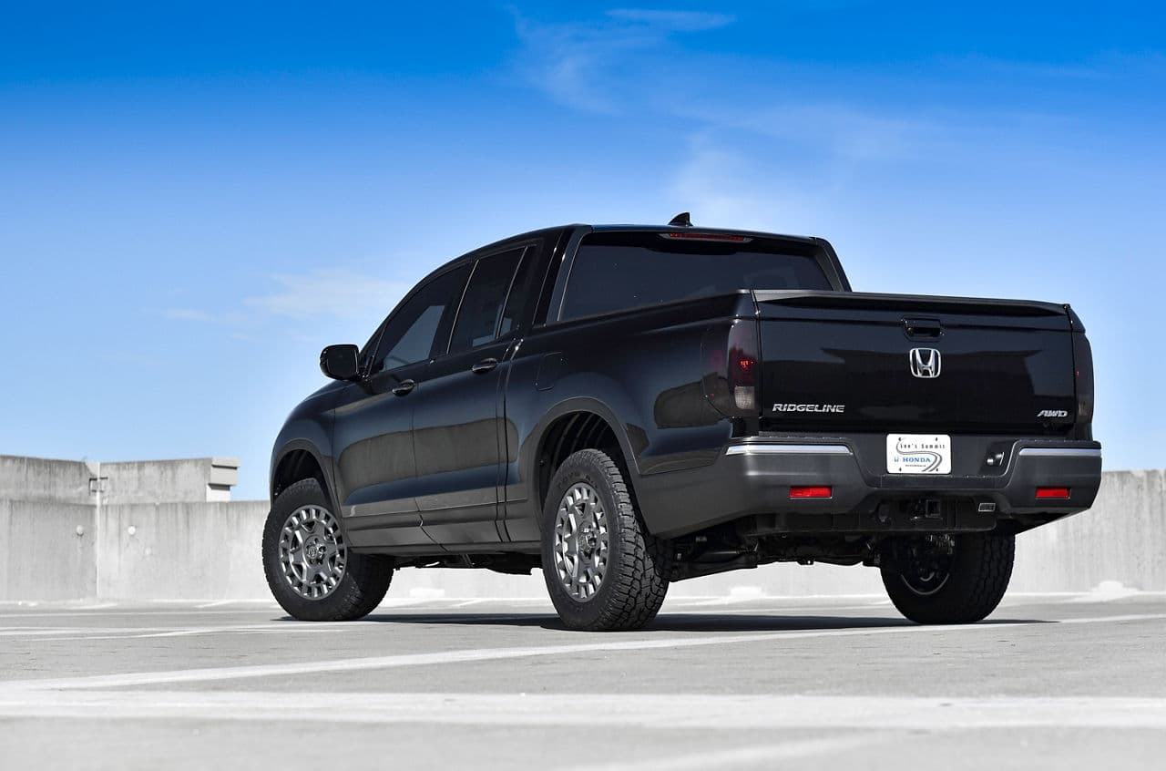 Rear view of 2020 Honda Ridgeline with vehicle wraps