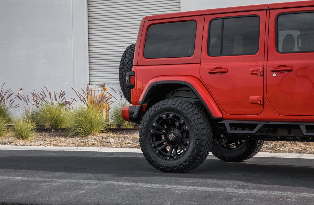Side profile of 2020 Jeep Wrangler Sahara with truck suv wheels