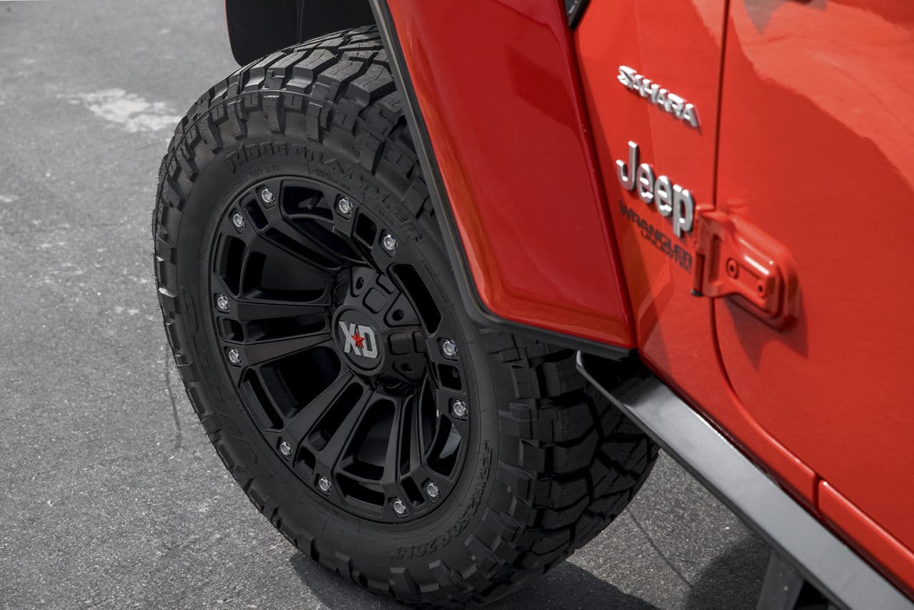 Rear view of 2020 Jeep Wrangler Sahara with truck suv wheels