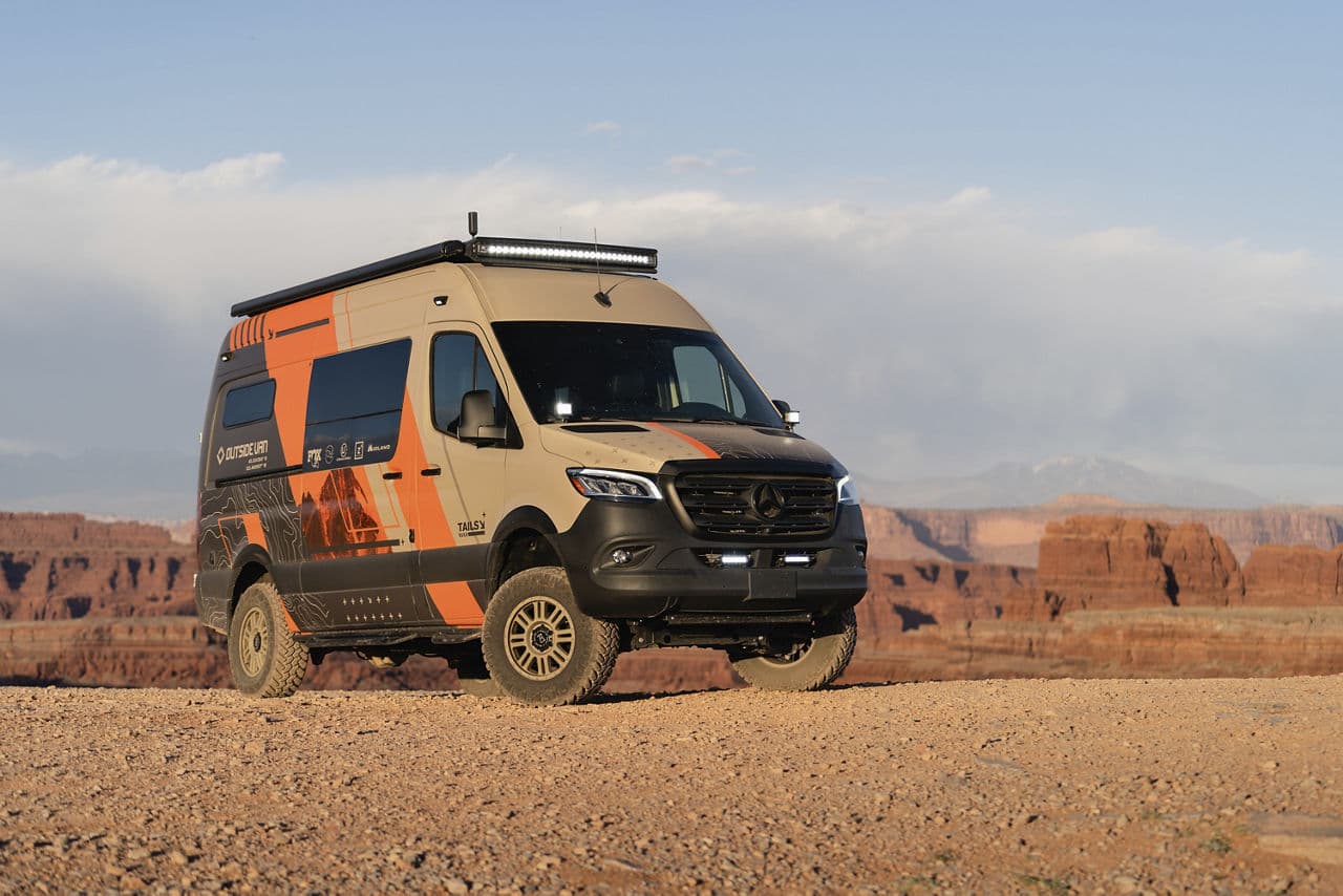 Front view of 2020 Mercedes-Benz Sprinter with vehicle wraps