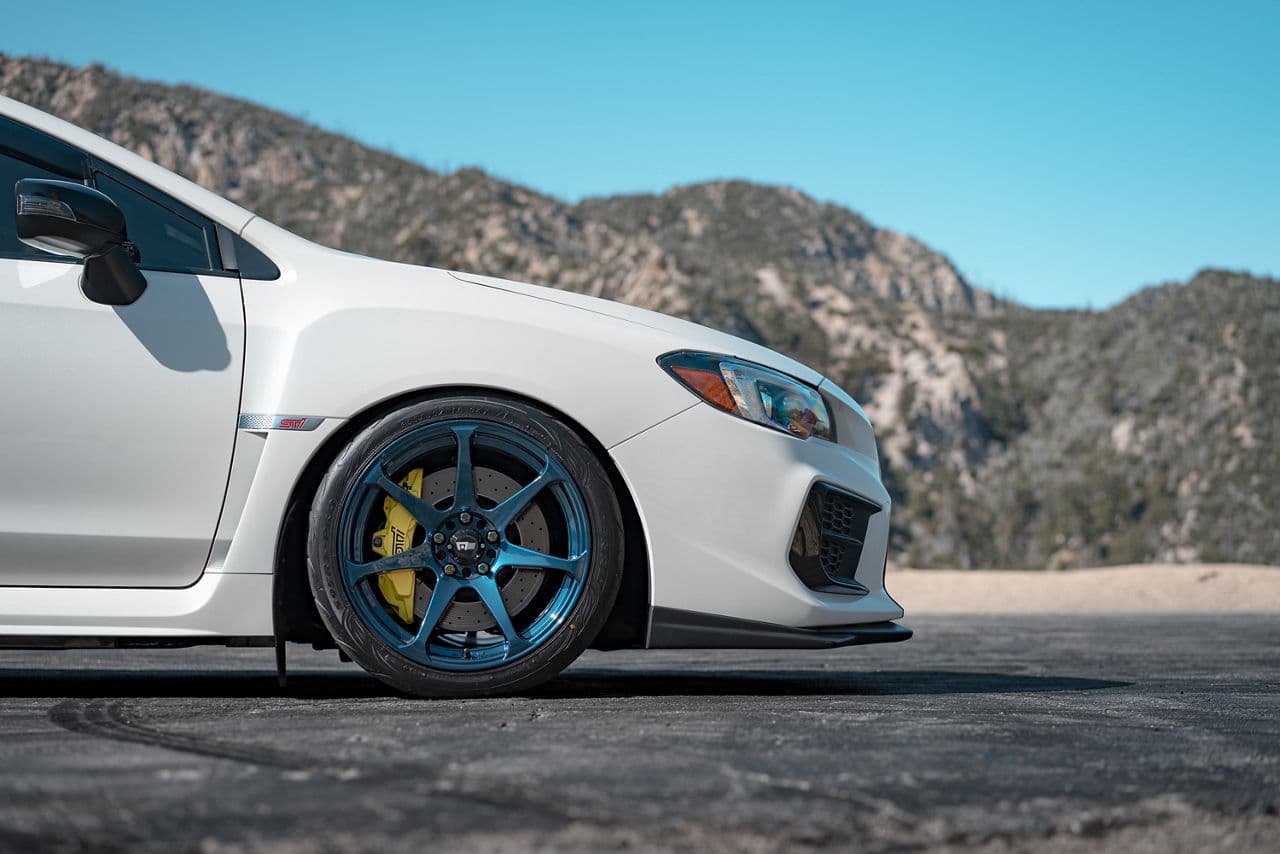 Side profile of 2020 Subaru WRX STI with vehicle wraps