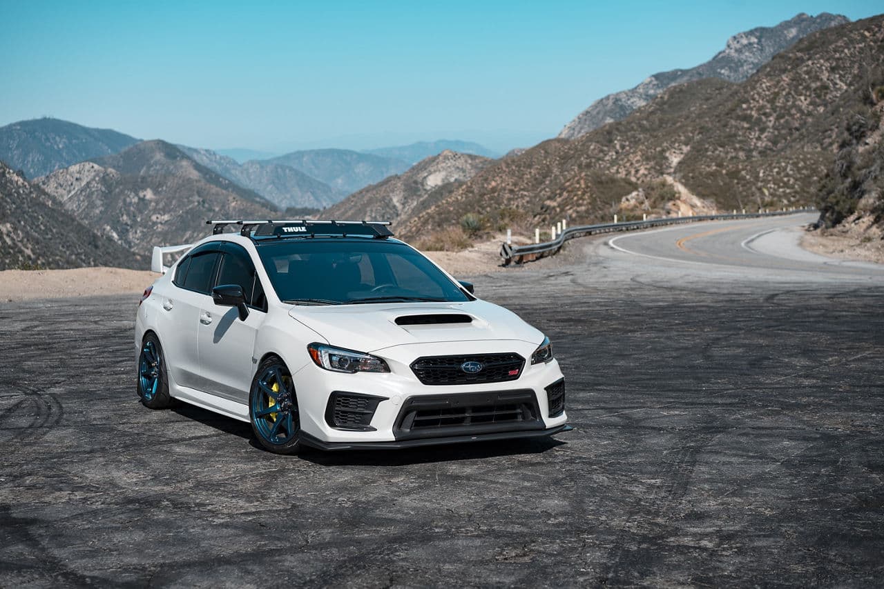 Rear view of 2020 Subaru WRX STI with vehicle wraps