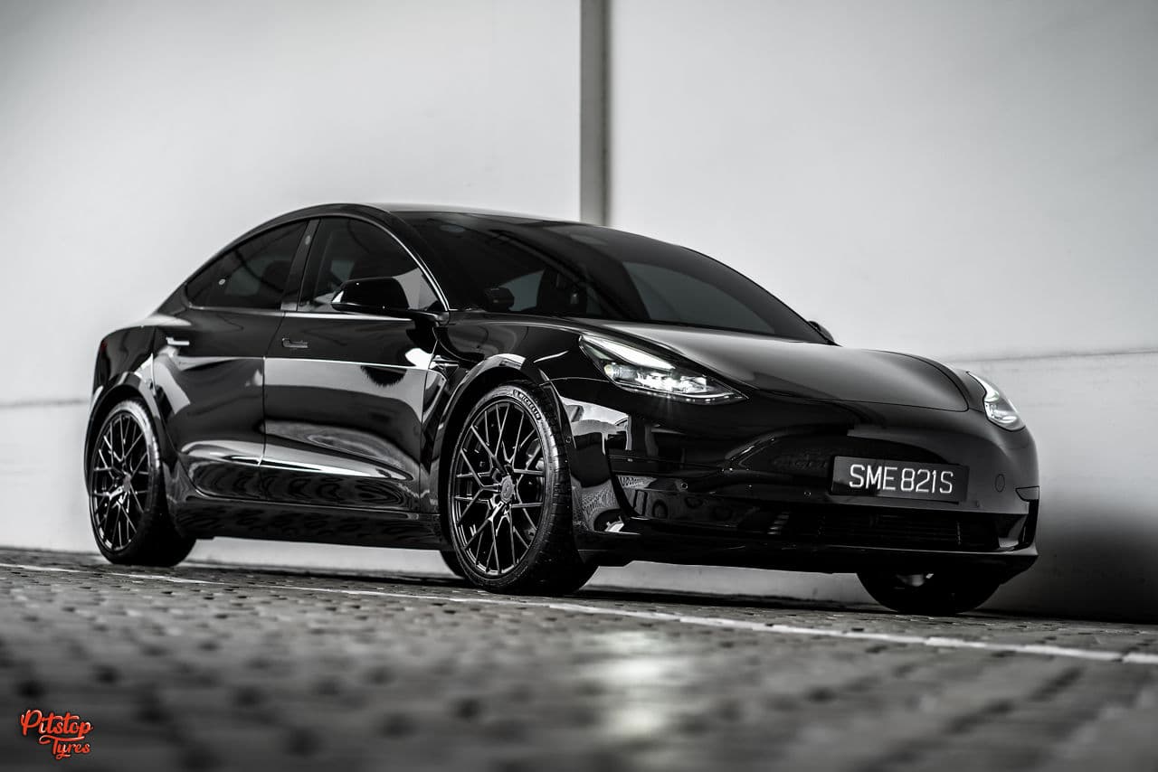 Front view of 2020 Tesla Model 3 with wheels