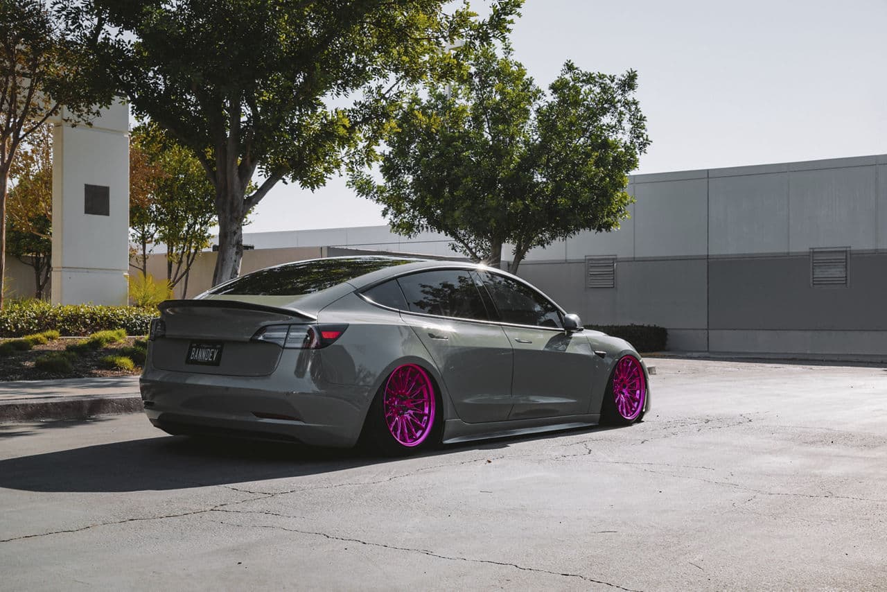 Side profile of 2020 Tesla Model 3 with wheels