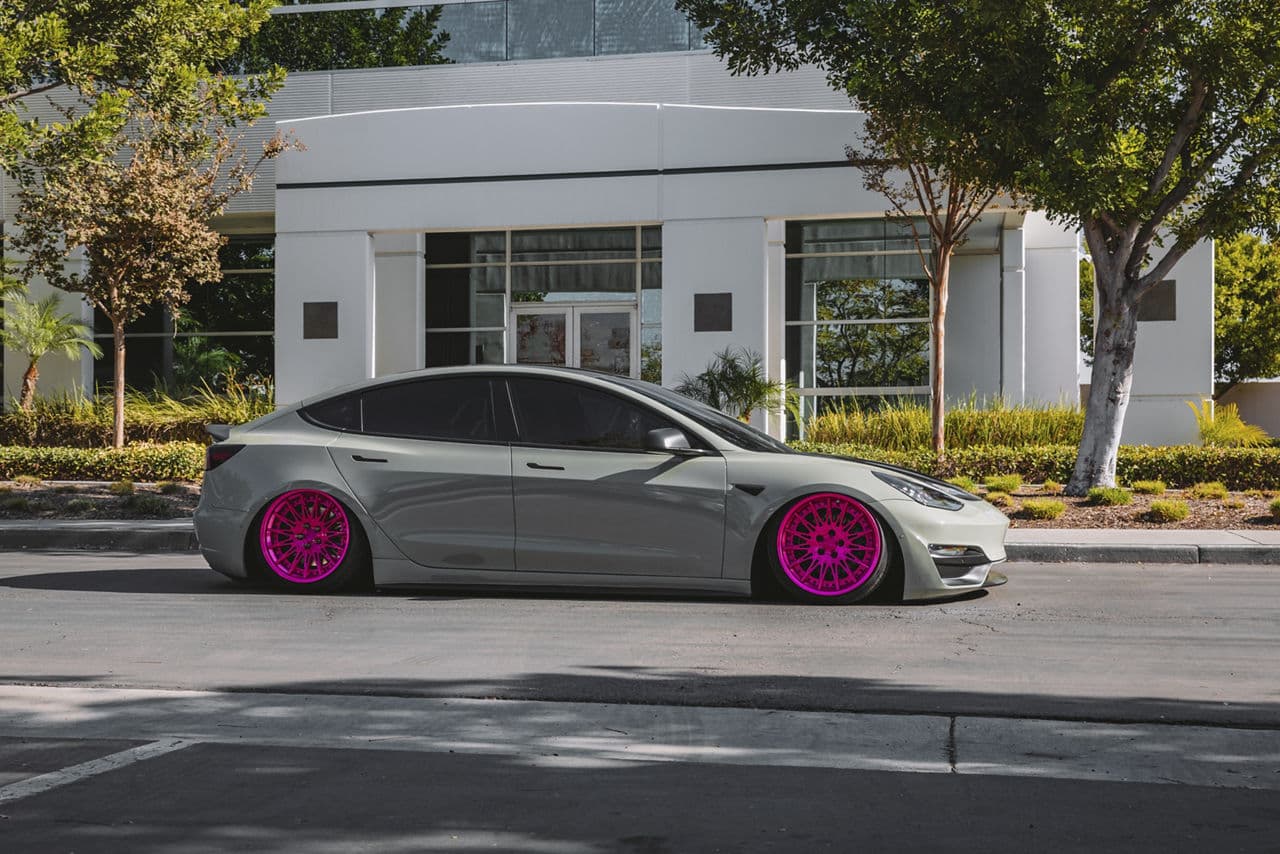 Rear view of 2020 Tesla Model 3 with wheels