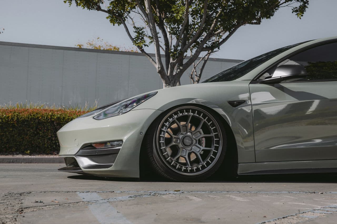 Rear view of 2020 Tesla Model 3 with wheels