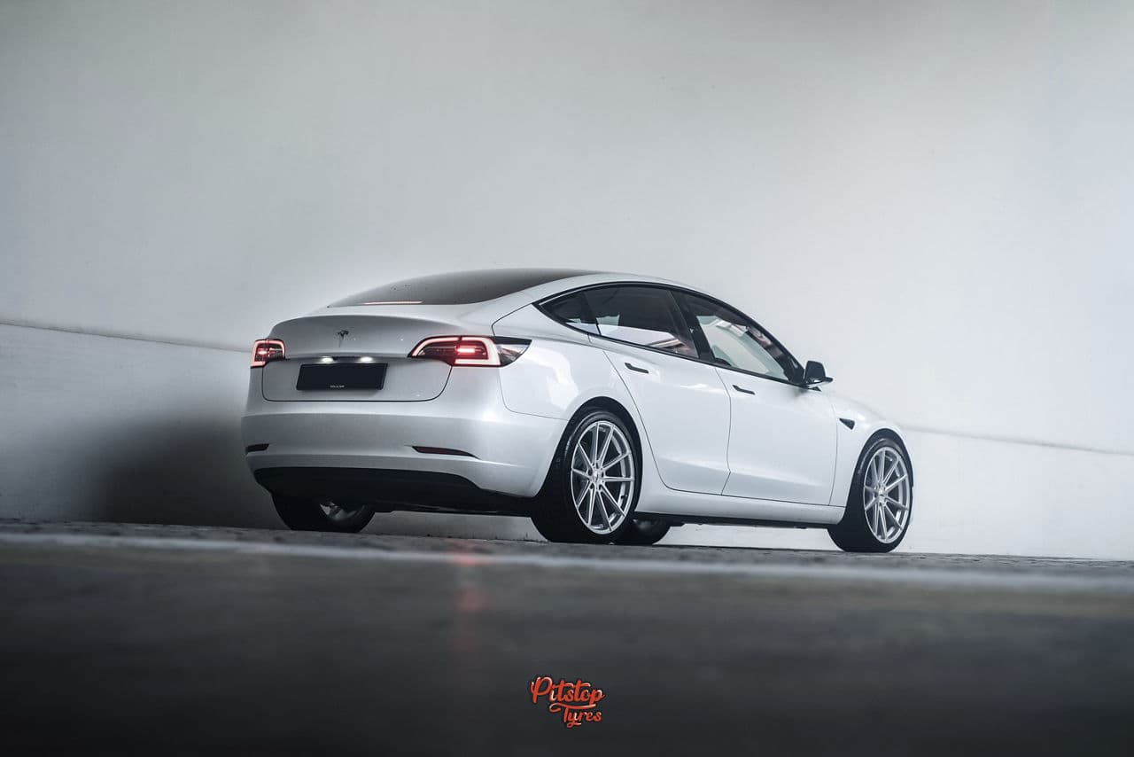 Front view of 2020 Tesla Model 3 with wheels