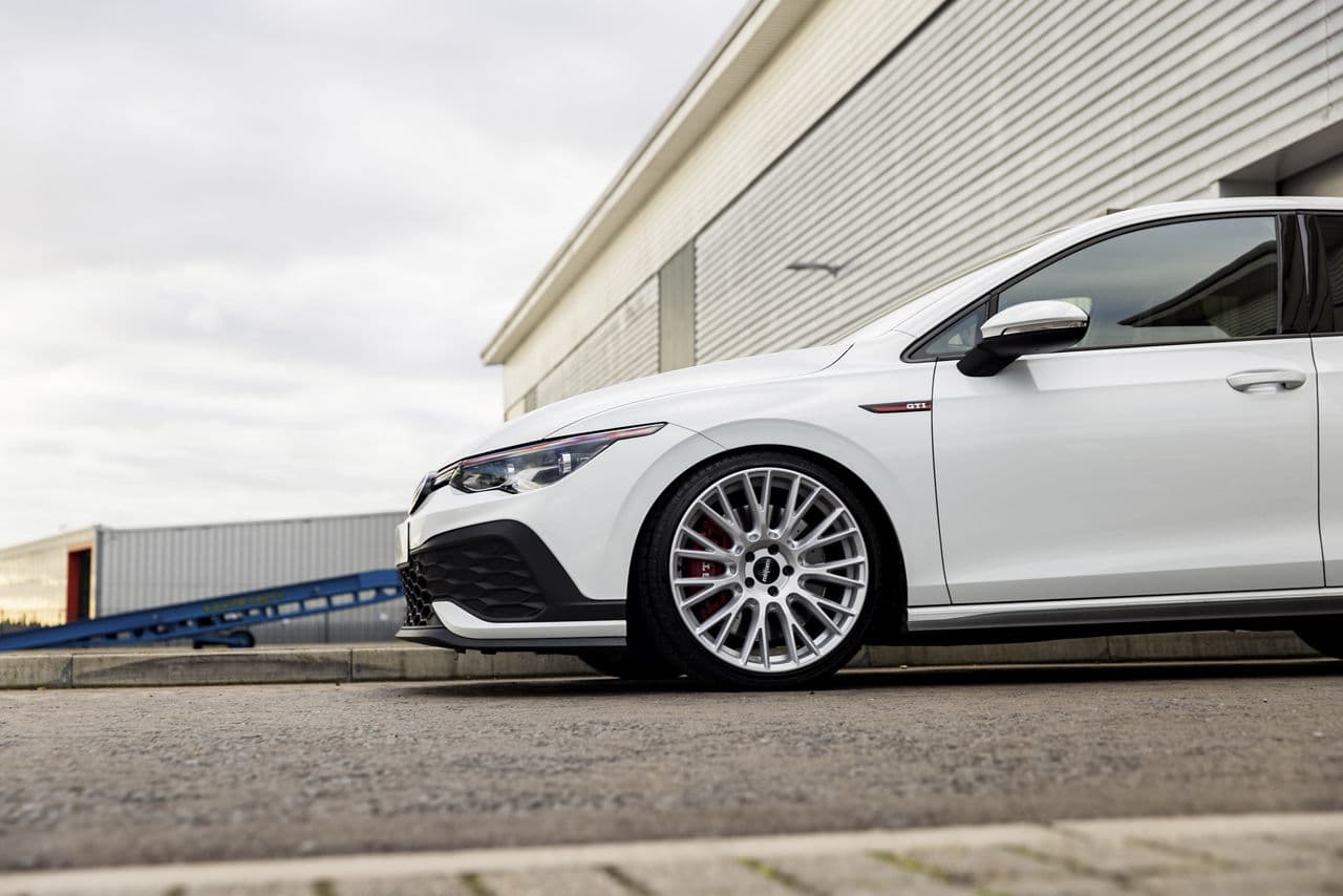 Side profile of 2020 Volkswagen Golf GTI with tuner wheels
