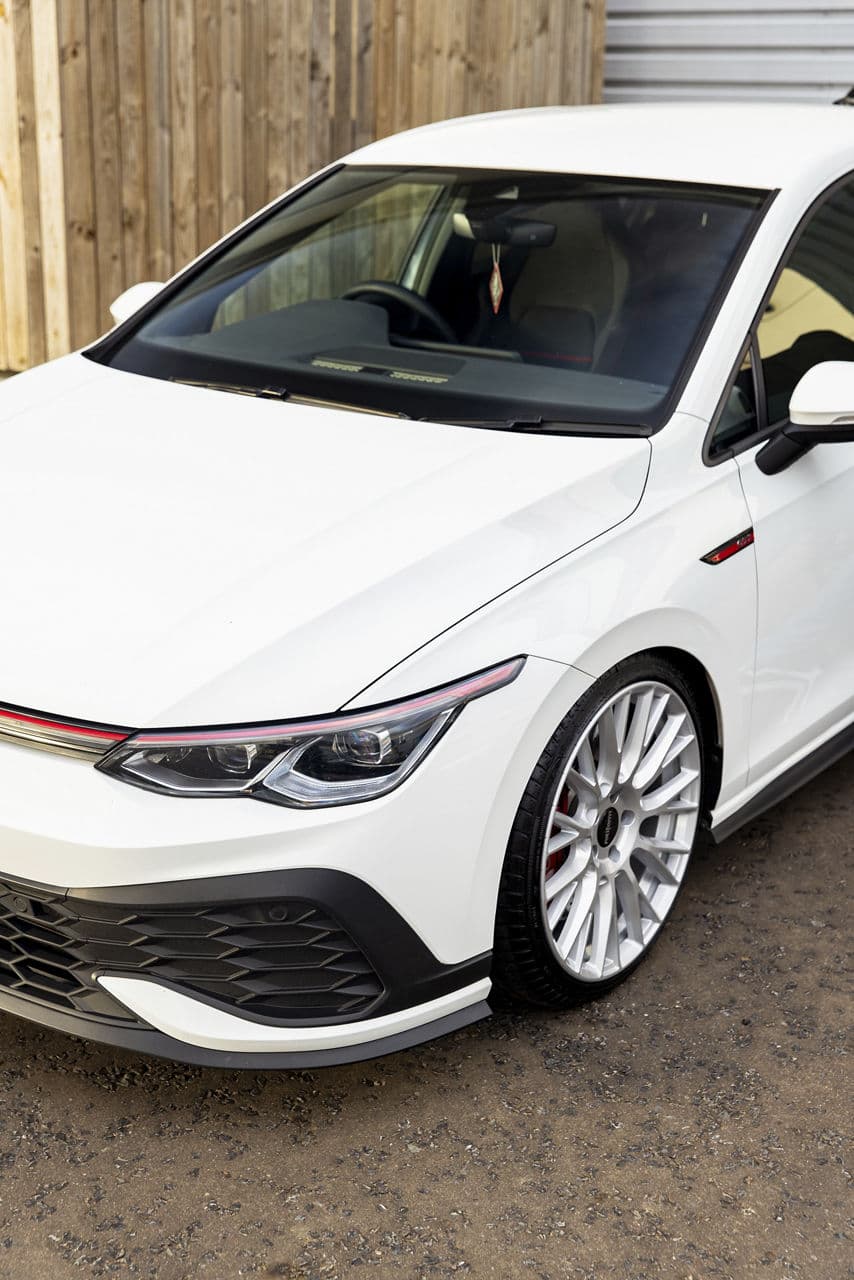 Rear view of 2020 Volkswagen Golf GTI with tuner wheels
