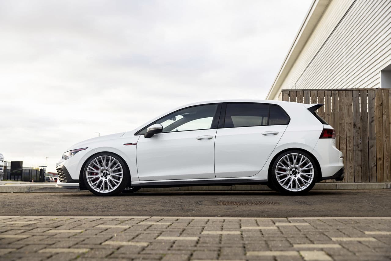 Detail view of 2020 Volkswagen Golf GTI with tuner wheels