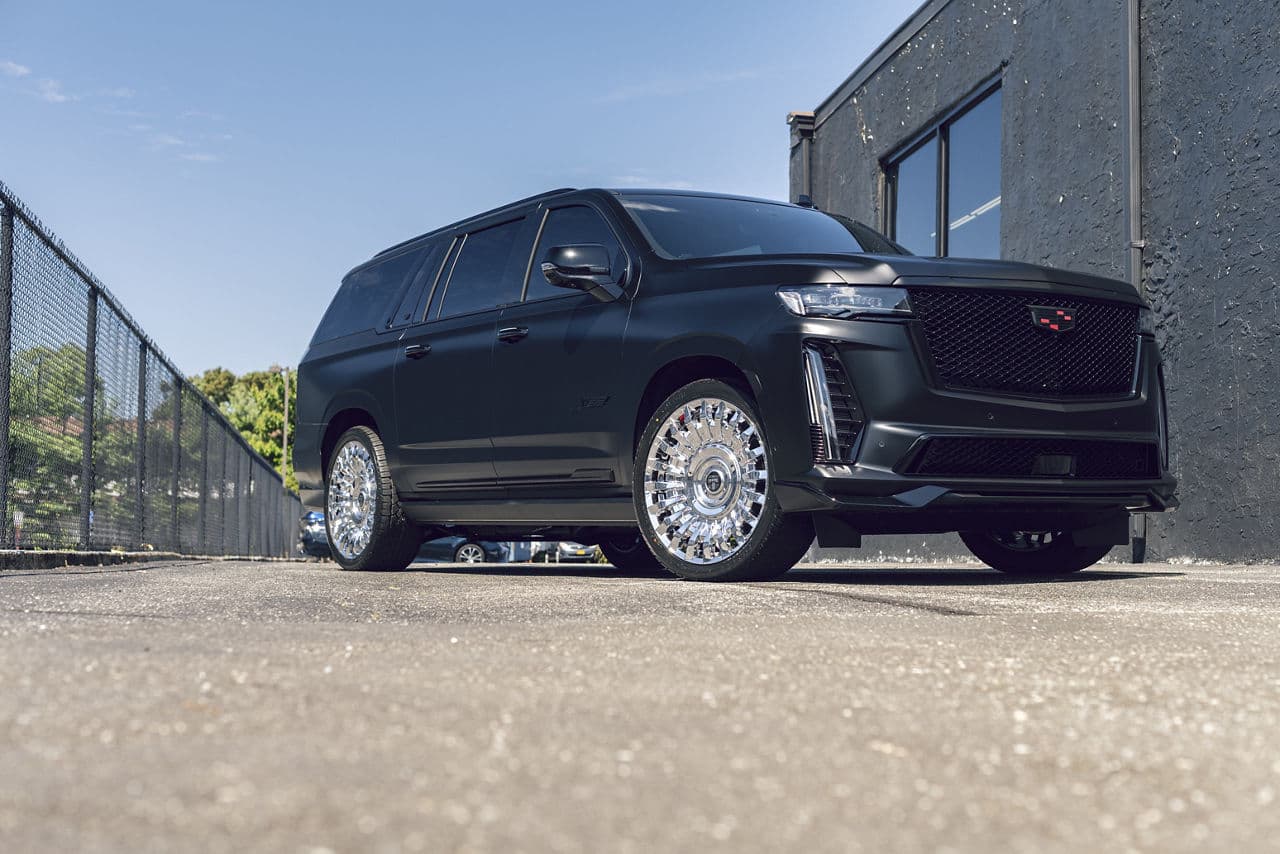 Front view of 2021 Cadillac Escalade with wheels