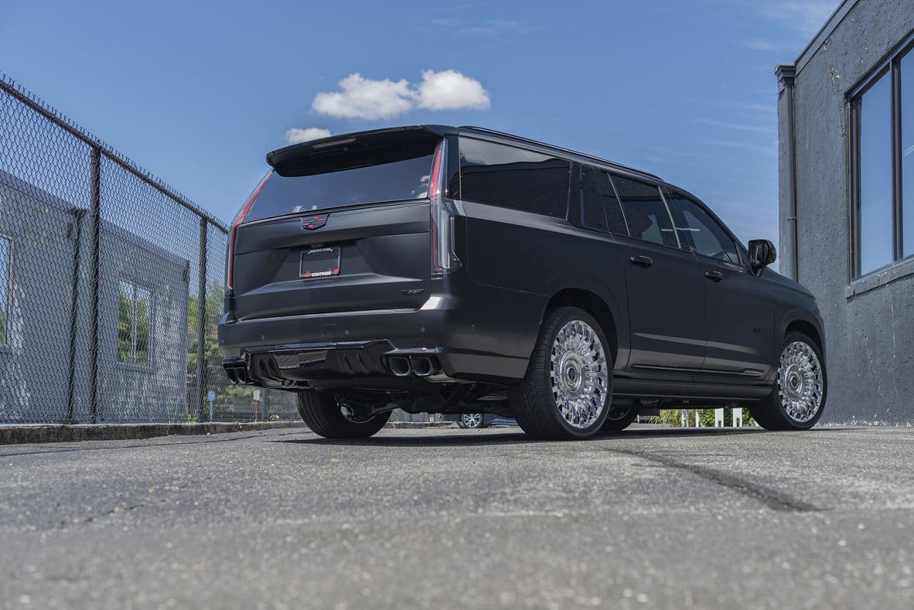 Rear view of 2021 Cadillac Escalade with wheels