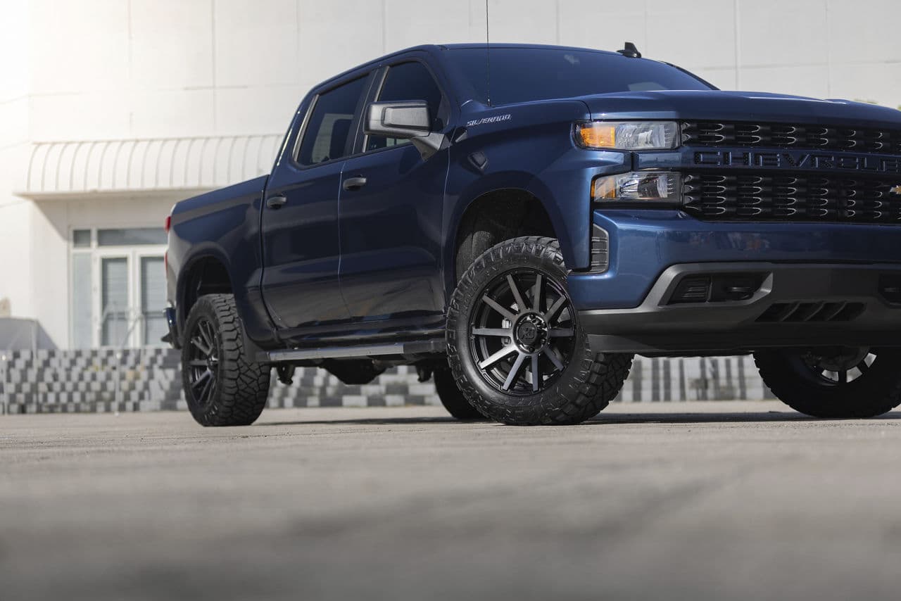 Side profile of 2021 Chevrolet Silverado with wheels