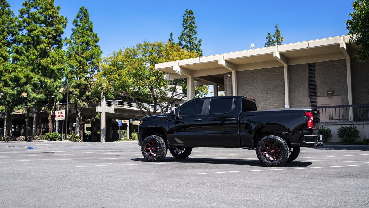 Side profile of 2021 Chevrolet Silverado with wheels