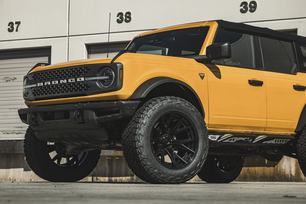 Rear view of 2021 Ford Bronco Badlands with truck suv wheels