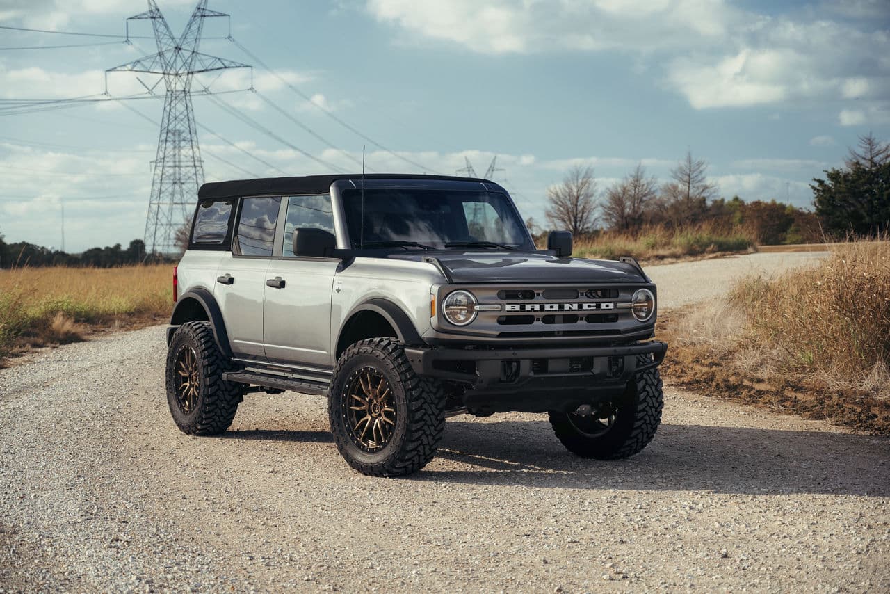 Front view of 2021 Ford Bronco with truck suv wheels