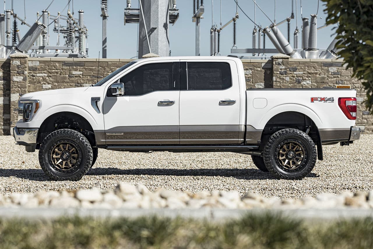 Rear view of 2021 Ford F150 King Ranch with wheels