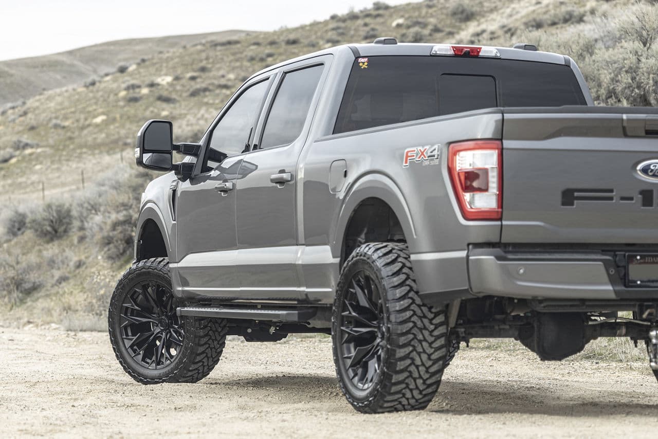 Rear view of 2021 Ford F150 Lariat with truck suv wheels