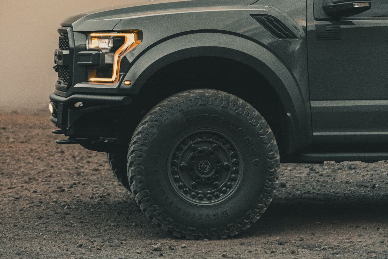 Side profile of 2021 Ford F150 Raptor with wheels