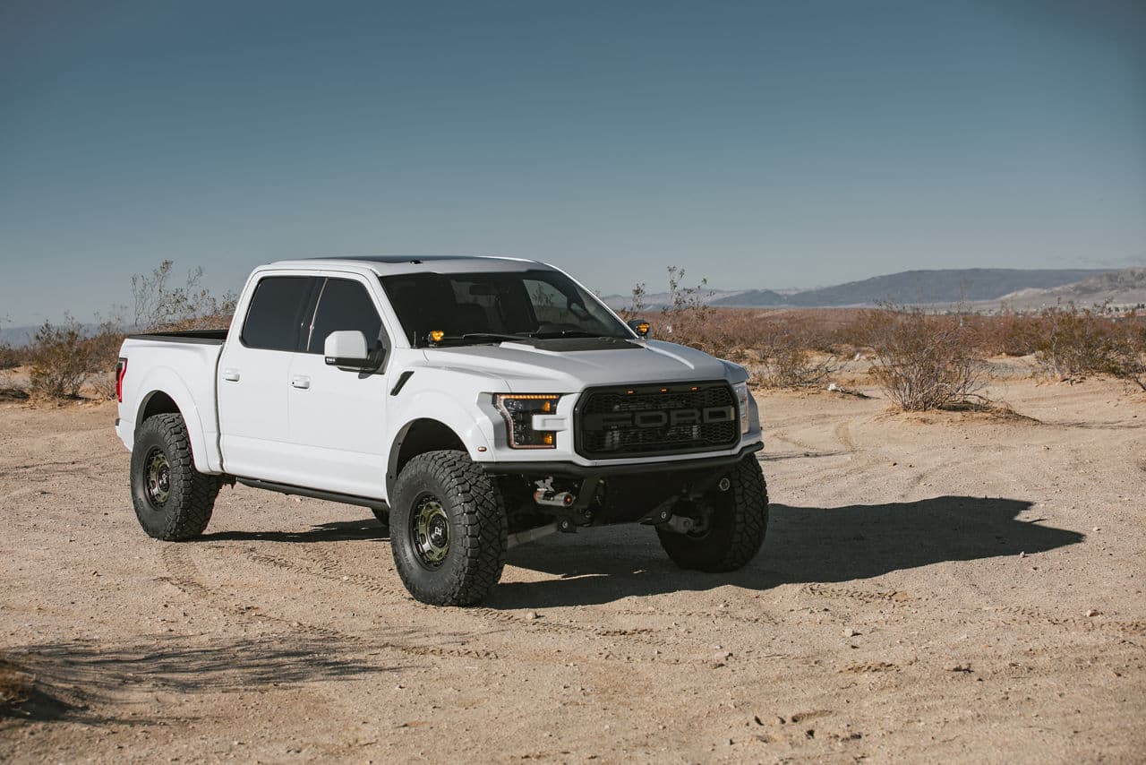 Side profile of 2021 Ford F150 Raptor with wheels