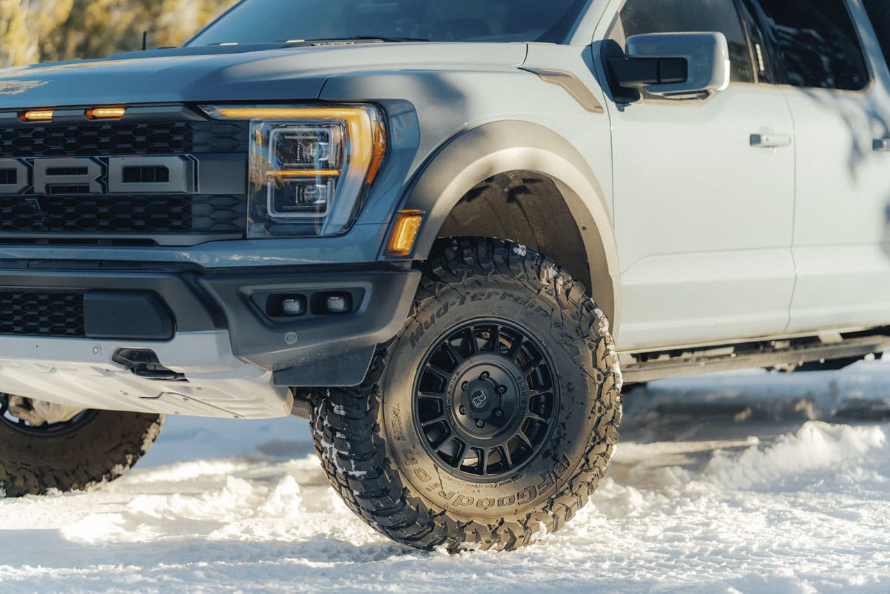 Side profile of 2021 Ford F150 Raptor with wheels