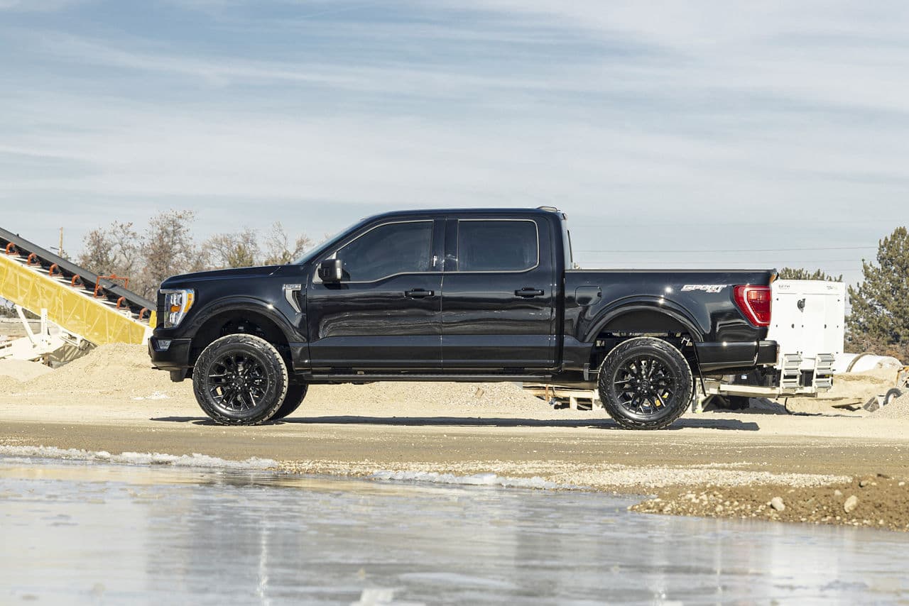 Rear view of 2021 Ford F150 Sport with wheels