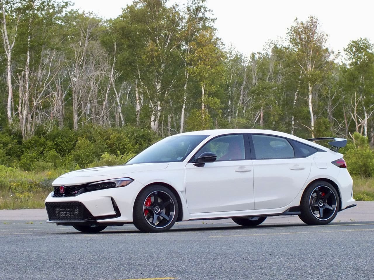 Side profile of 2021 Honda Civic Type R with tuner wheels