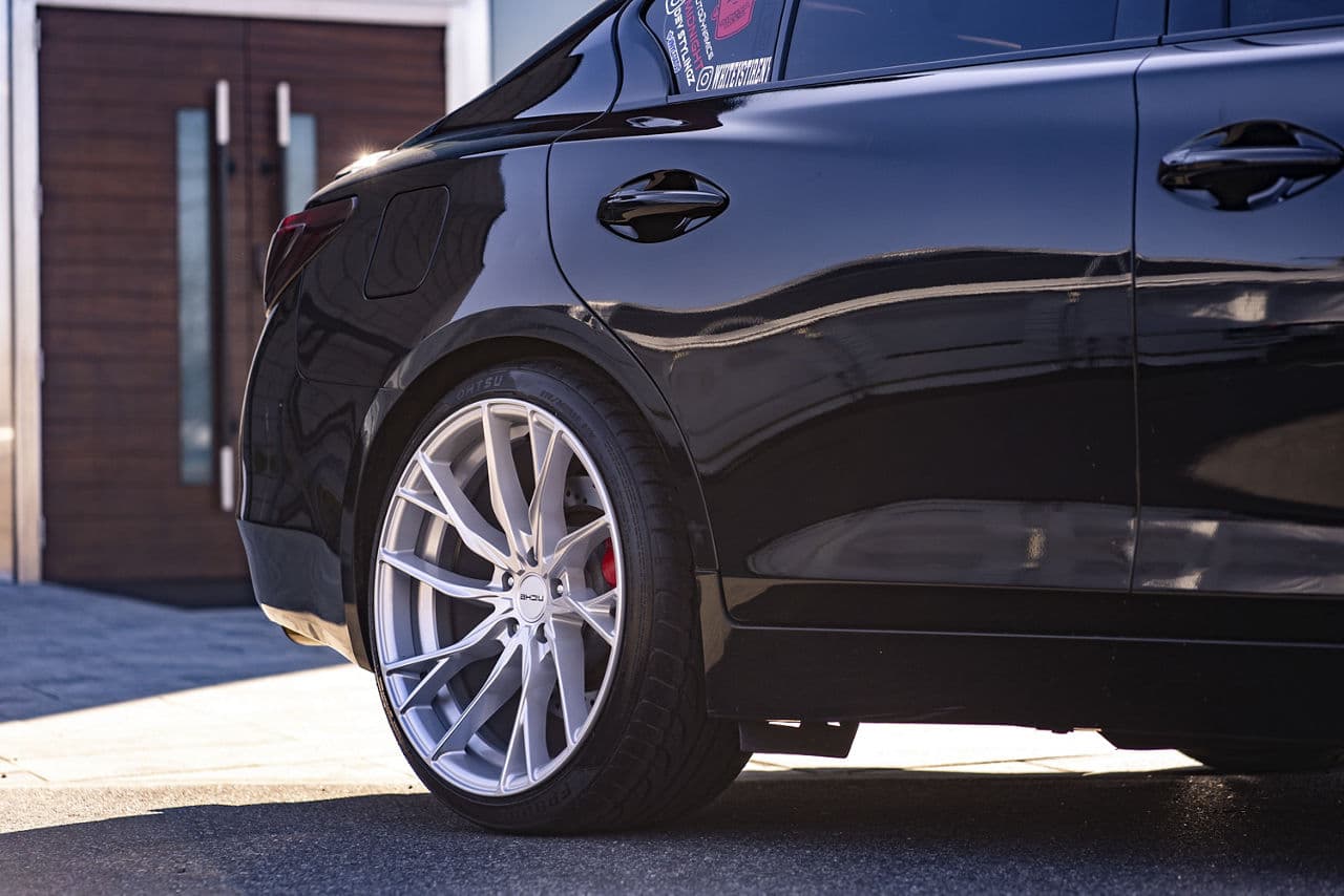 Side profile of 2021 Infiniti Q50 with wheels