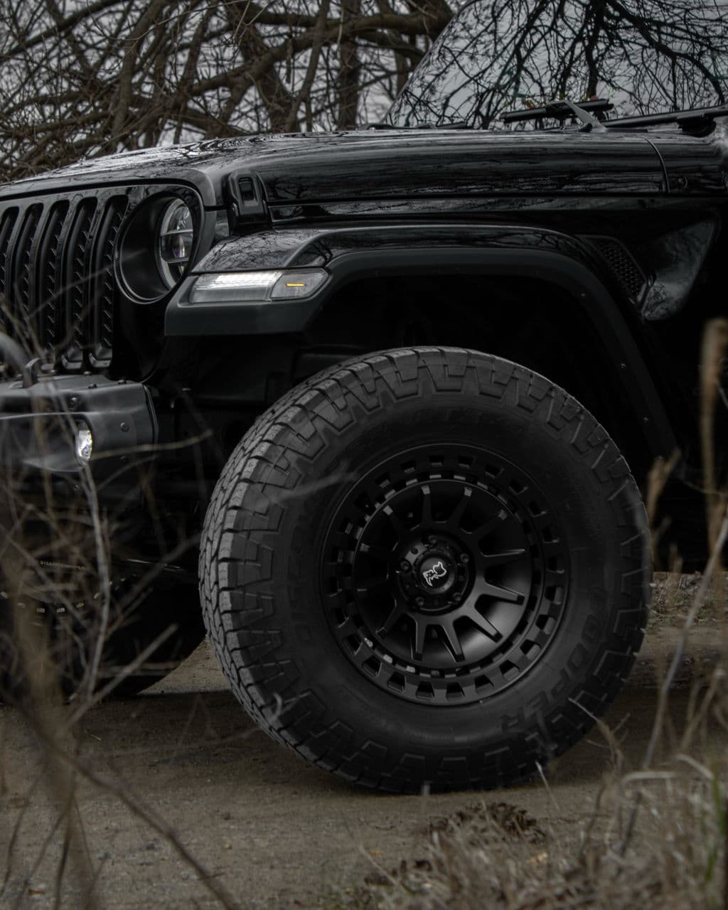 Side profile of 2021 Jeep Gladiator with truck suv wheels