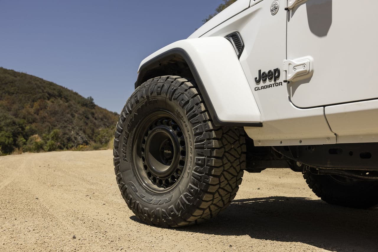 Rear view of 2021 Jeep Gladiator with truck suv wheels